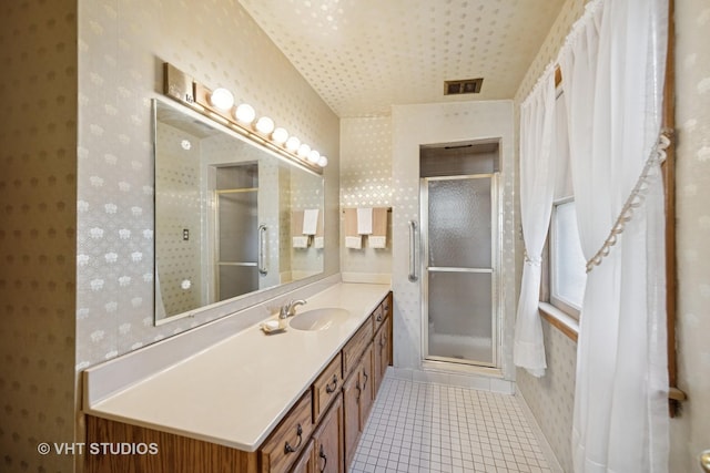 506 S Charleton St, Willow Springs, IL 60480 - full bath featuring wallpapered walls, vanity, a stall shower, and tile patterned floors