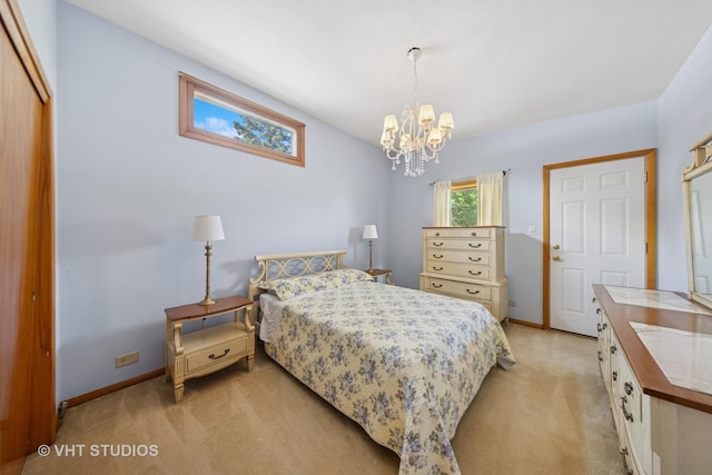 506 S Charleton St, Willow Springs, IL 60480 - bedroom with light colored carpet, a chandelier, and a closet