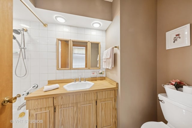 506 S Charleton St, Willow Springs, IL 60480 - bathroom featuring vanity and backsplash