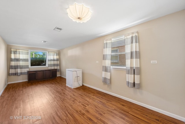 506 S Charleton St, Willow Springs, IL 60480 - spare room featuring wood finished floors and baseboards
