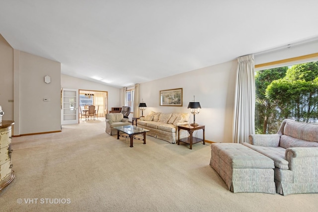 506 S Charleton St, Willow Springs, IL 60480 - living room featuring light carpet and vaulted ceiling