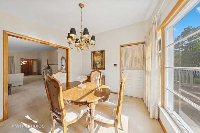 506 S Charleton St, Willow Springs, IL 60480 - dining room with a chandelier and light colored carpet
