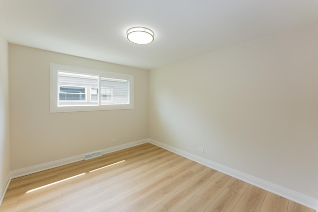 570 Dawes Ave, Glen Ellyn, IL 60137 - spare room featuring light wood-type flooring and baseboards