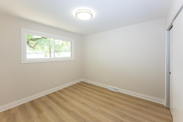 570 Dawes Ave, Glen Ellyn, IL 60137 - spare room with light wood-type flooring and baseboards
