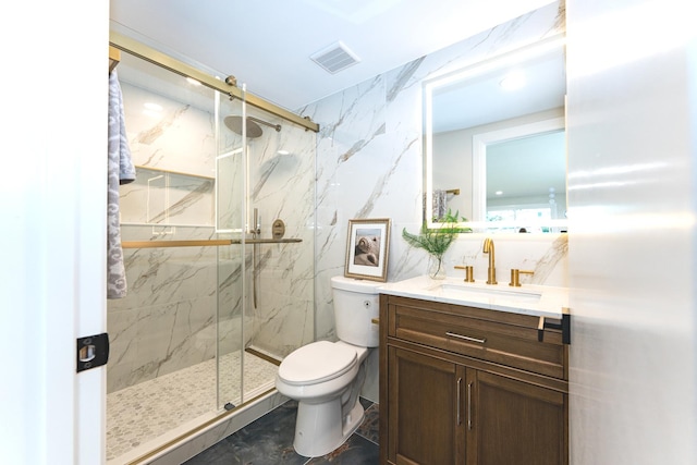 570 Dawes Ave, Glen Ellyn, IL 60137 - bathroom featuring a marble finish shower, vanity, and tile walls