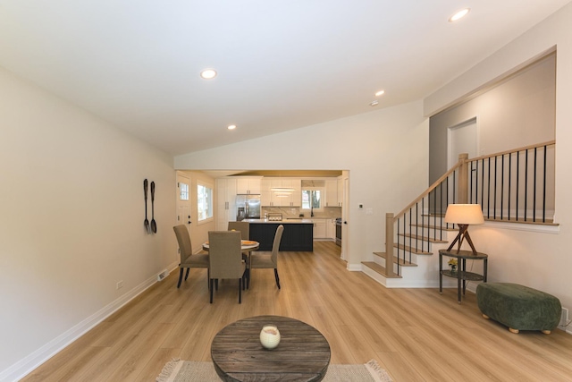 570 Dawes Ave, Glen Ellyn, IL 60137 - living room with light wood-style floors, recessed lighting, lofted ceiling, and stairway