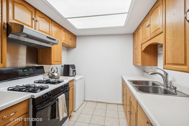 1410 N Whispering Springs Cir, Palatine, IL 60074 - kitchen with gas range, under cabinet range hood, light countertops, and light tile patterned flooring