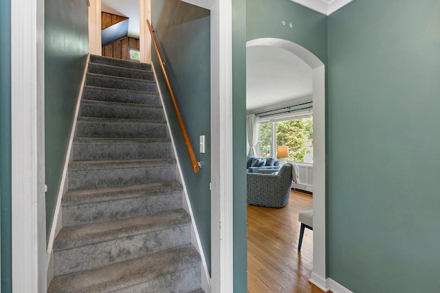 49 Burton Ave, Cary, IL 60013 - staircase featuring arched walkways and wood finished floors