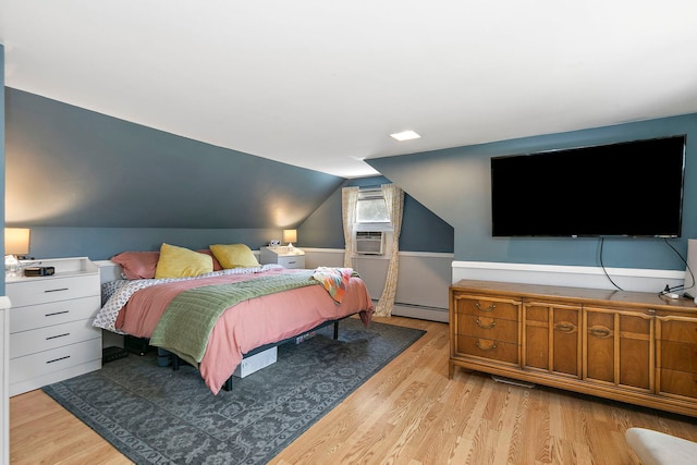 49 Burton Ave, Cary, IL 60013 - bedroom featuring light wood-style flooring, a baseboard radiator, cooling unit, and lofted ceiling