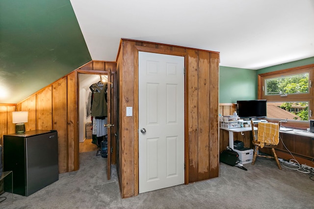 49 Burton Ave, Cary, IL 60013 - carpeted office space with wooden walls and vaulted ceiling