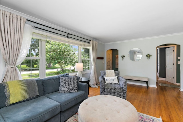 49 Burton Ave, Cary, IL 60013 - living room with arched walkways, crown molding, and wood finished floors