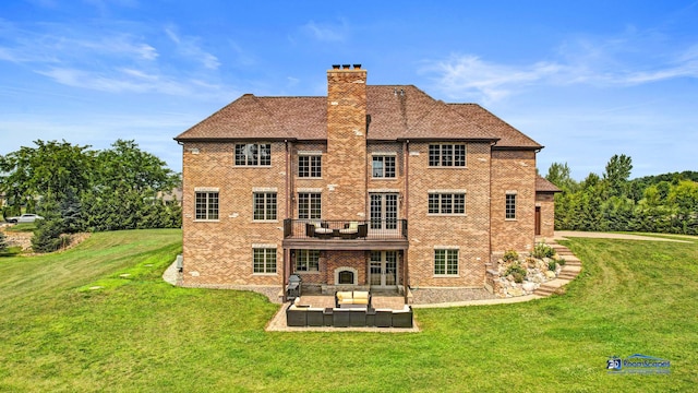 19113 Lauren Ln, Marengo, IL 60152 - back of house with a patio, a lawn, a chimney, brick siding, and a deck