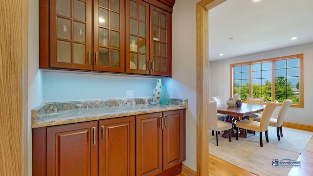 19113 Lauren Ln, Marengo, IL 60152 - bar featuring light wood-style floors and recessed lighting