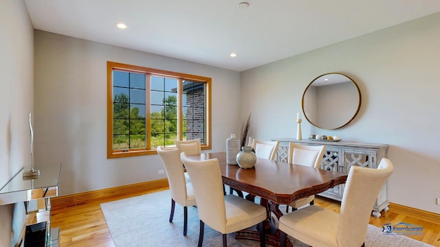 19113 Lauren Ln, Marengo, IL 60152 - dining space with wood finished floors and recessed lighting