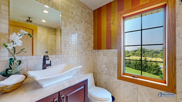 19113 Lauren Ln, Marengo, IL 60152 - bathroom featuring tile walls, vanity, and recessed lighting