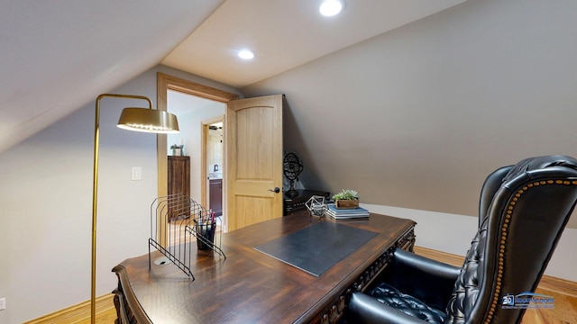 19113 Lauren Ln, Marengo, IL 60152 - home office with lofted ceiling, wood finished floors, and recessed lighting