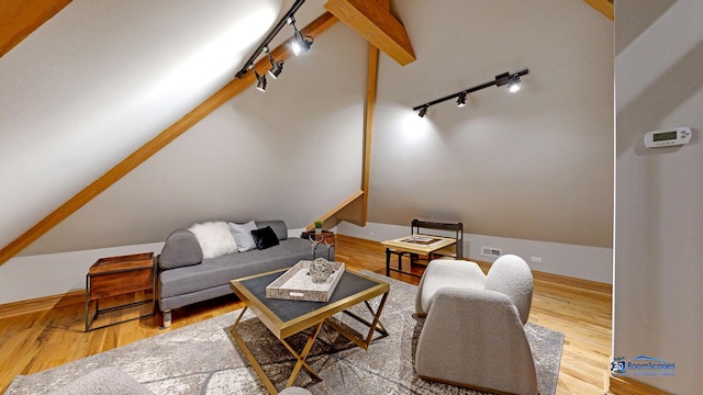 19113 Lauren Ln, Marengo, IL 60152 - living room with rail lighting, wood finished floors, and lofted ceiling