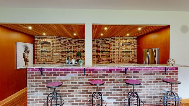 19113 Lauren Ln, Marengo, IL 60152 - indoor bar with stainless steel fridge, wooden ceiling, and recessed lighting
