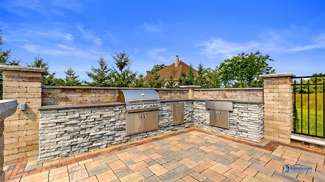 19113 Lauren Ln, Marengo, IL 60152 - view of patio / terrace featuring exterior kitchen