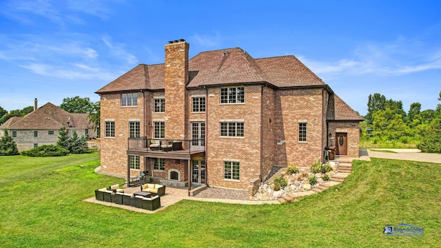 19113 Lauren Ln, Marengo, IL 60152 - rear view of property featuring a chimney, a yard, a patio area, and brick siding