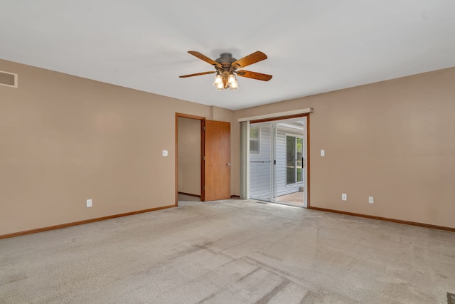 955 E 5th St, Coal City, IL 60416 - empty room featuring ceiling fan and light colored carpet