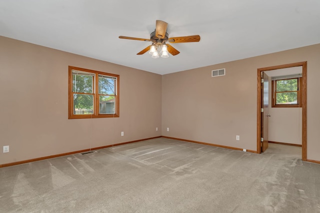 955 E 5th St, Coal City, IL 60416 - unfurnished room featuring a ceiling fan and light carpet