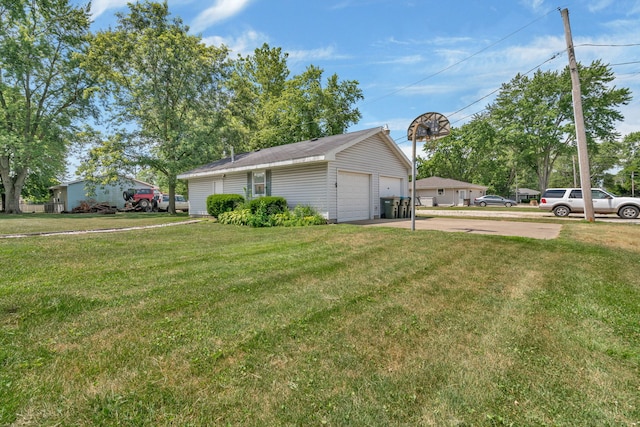 955 E 5th St, Coal City, IL 60416 - view of home's exterior featuring a lawn and a detached garage