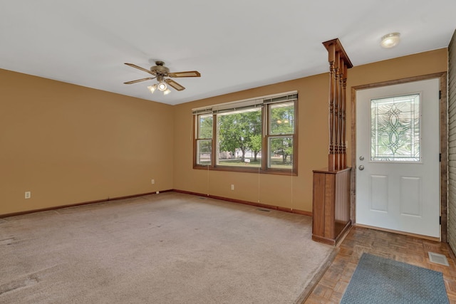 955 E 5th St, Coal City, IL 60416 - entryway featuring a ceiling fan and baseboards