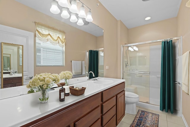 14300 Sundance Dr, Huntley, IL 60142 - full bathroom featuring a shower stall, tile patterned floors, and vanity