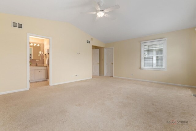 1804 Monroe Ct, Glenview, IL 60025 - unfurnished bedroom with light carpet, lofted ceiling, and ensuite bathroom