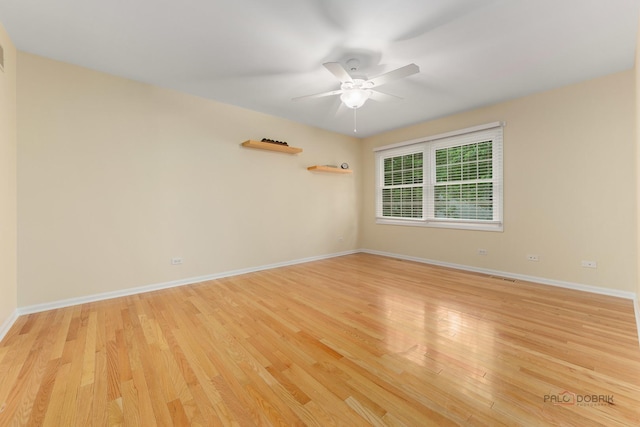 1804 Monroe Ct, Glenview, IL 60025 - spare room with light wood finished floors and a ceiling fan
