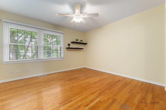 1804 Monroe Ct, Glenview, IL 60025 - spare room featuring light wood-style flooring and ceiling fan