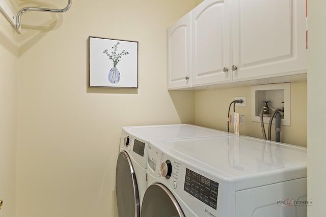 1804 Monroe Ct, Glenview, IL 60025 - laundry room featuring cabinet space and separate washer and dryer