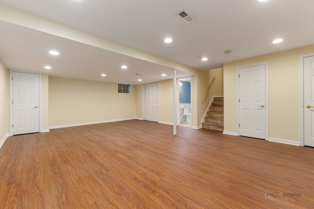 1804 Monroe Ct, Glenview, IL 60025 - finished basement with stairs, wood finished floors, and recessed lighting