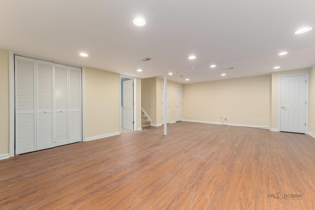 1804 Monroe Ct, Glenview, IL 60025 - finished basement with recessed lighting, stairway, and wood finished floors