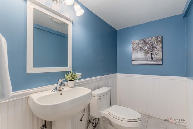 1804 Monroe Ct, Glenview, IL 60025 - half bath featuring wainscoting and tile patterned flooring