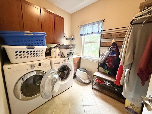 38422 N Adams St, Lake Villa, IL 60046 - washroom featuring cabinet space, washer and dryer, and light tile patterned floors