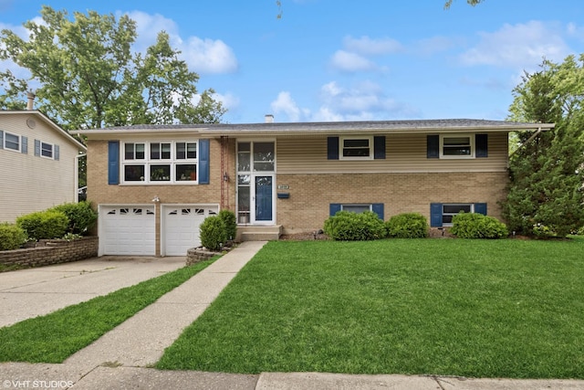 1217 E Pratt Dr, Palatine, IL 60074 - bi-level home featuring brick siding, an attached garage, driveway, and a front lawn