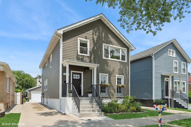 5106 W Eddy St, Chicago, IL 60641 - view of front of home with an outdoor structure and a detached garage