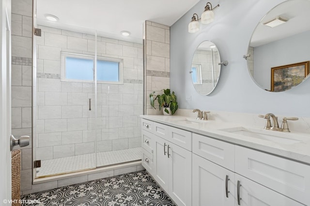 5106 W Eddy St, Chicago, IL 60641 - full bath with double vanity, a shower stall, and tile patterned floors