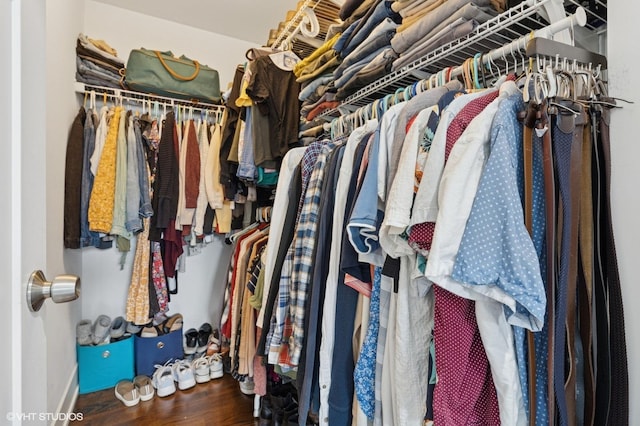 5106 W Eddy St, Chicago, IL 60641 - walk in closet featuring wood finished floors