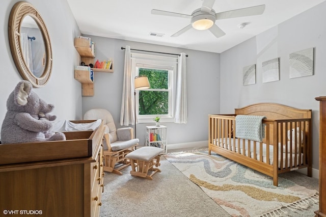 5106 W Eddy St, Chicago, IL 60641 - bedroom featuring carpet, a crib, and ceiling fan