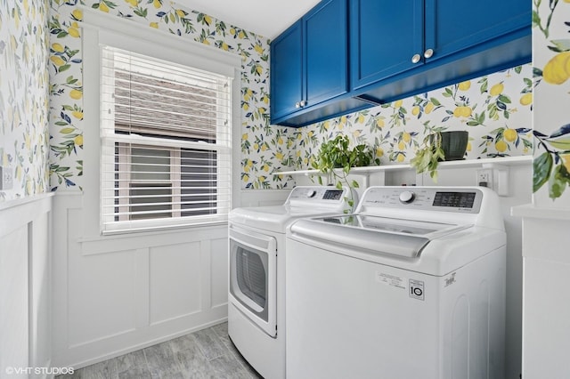 5106 W Eddy St, Chicago, IL 60641 - washroom with wallpapered walls, washing machine and dryer, cabinet space, light wood-style flooring, and a wainscoted wall