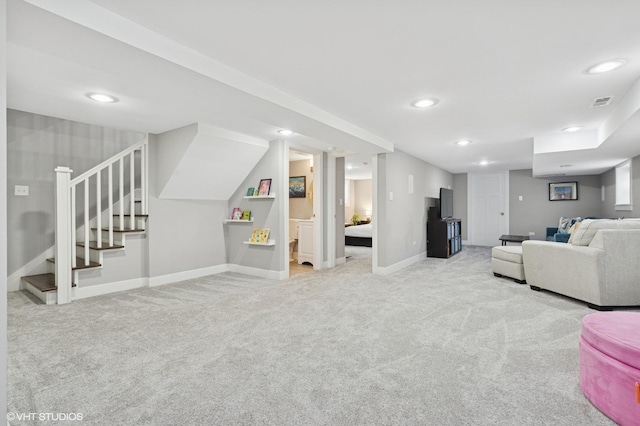 5106 W Eddy St, Chicago, IL 60641 - living room with stairs, light colored carpet, and recessed lighting