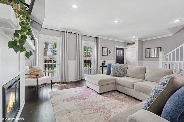 5106 W Eddy St, Chicago, IL 60641 - living room featuring ornamental molding, recessed lighting, wood finished floors, stairs, and a wainscoted wall