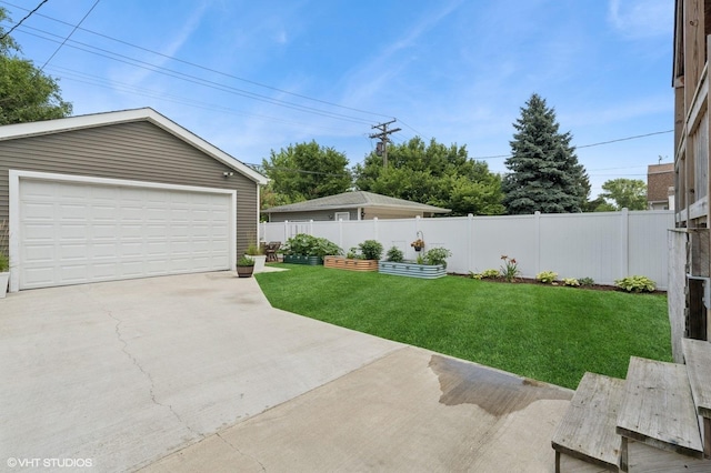 5106 W Eddy St, Chicago, IL 60641 - view of yard featuring an outdoor structure and a detached garage