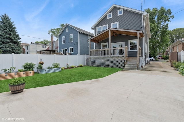 5106 W Eddy St, Chicago, IL 60641 - view of front of house with covered porch and concrete driveway