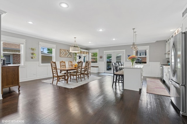 5106 W Eddy St, Chicago, IL 60641 - dining area featuring a decorative wall, french doors, dark wood-style flooring, crown molding, and a wainscoted wall