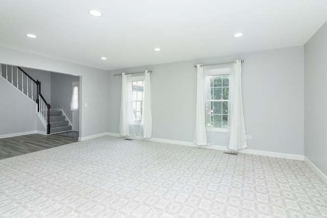 1557 Scottdale Cir, Wheaton, IL 60189 - unfurnished room featuring stairs, recessed lighting, and carpet floors