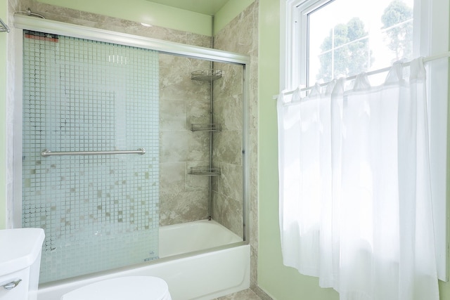 1557 Scottdale Cir, Wheaton, IL 60189 - bathroom with toilet and bath / shower combo with glass door